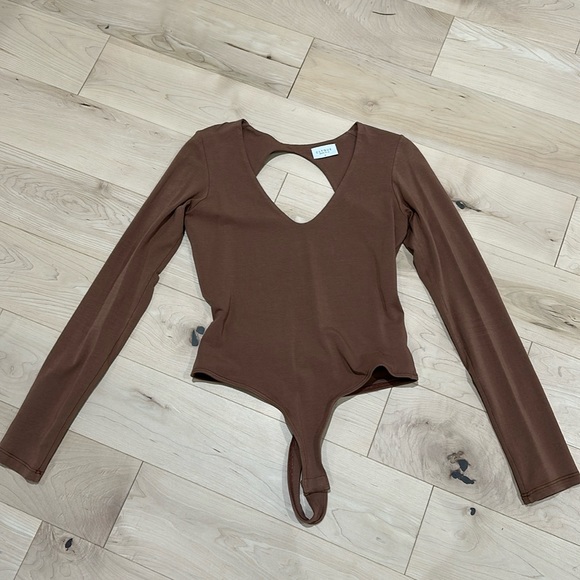 Clyque Tops - Clyque size medium bodysuit with cutout back